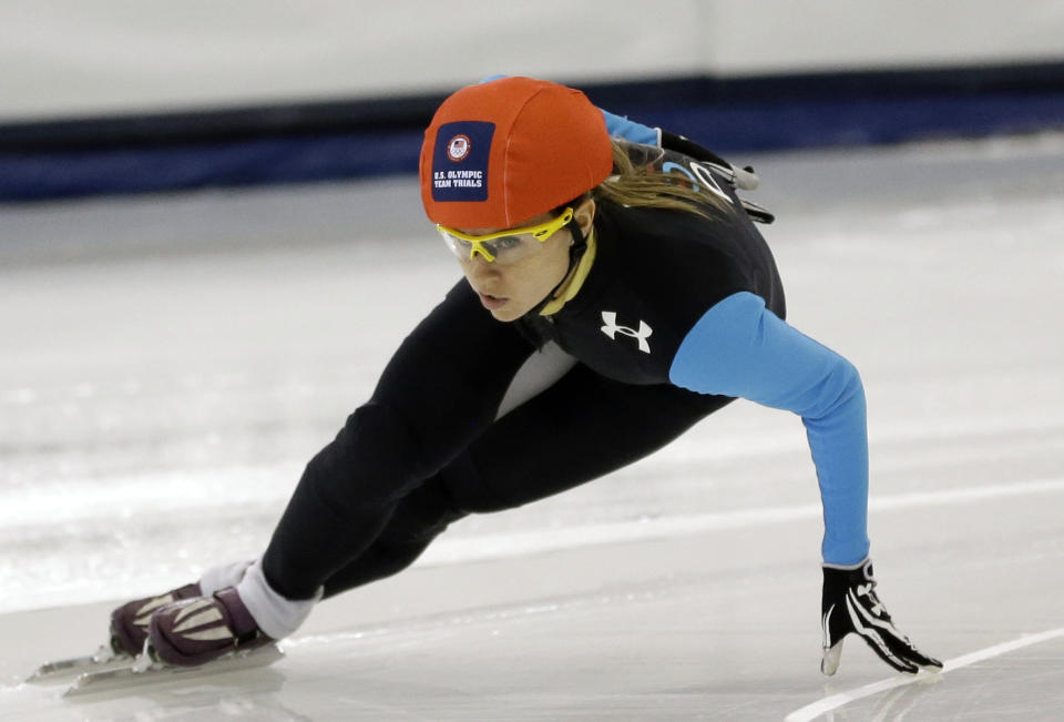 Jessica Smith competes in the women's 1,500 meters during the U.S. Olympic short track trials Friday, Jan. 3, 2014, in Kearns, Utah. (AP Photo/Rick Bowmer)