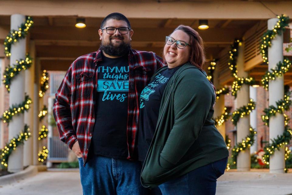 Eric and Chelsy Nolasco stand in front of the Ronald McDonald house at Cook's Children's Medical Center in Fort Worth, Texas on Dec. 2, 2023. Their son Gabe Nolasco, 4, is currently recovering from a thymus transplant as treatment for his congenital athymia.