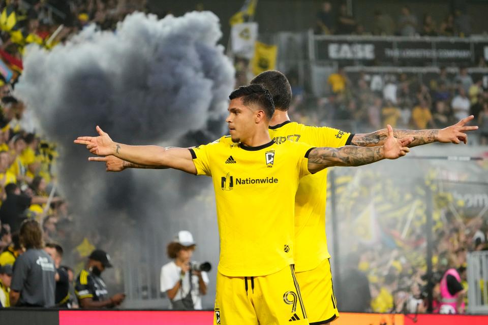 Aug 20, 2023; Columbus, Ohio, USA; Columbus Crew forward Cucho Hernandez (9) celebrates scoring a penalty kick goal with forward Christian Ramirez (17) during the first half of the MLS soccer match against FC Cincinnati at Lower.com Field.