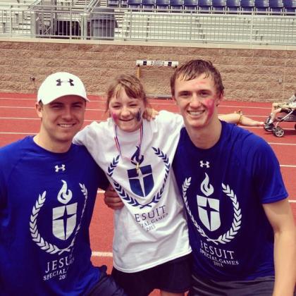 Jordan Spieth, left with his sister Ellie and brother Steven.