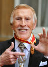 <p>Sir Bruce after he was knighted by Queen Elizabeth II during an Investiture ceremony at Buckingham Palace, London, in 2011. </p>