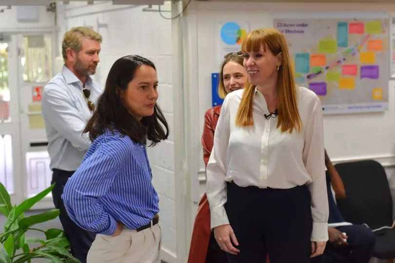 Angela Rayner smiling with staff during a campaign visit to Kensington