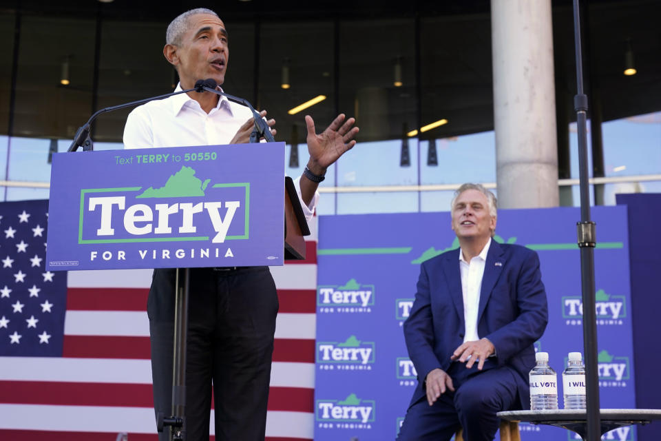 Former President Barack Obama, left, speaks during a rally with Democratic gubernatorial candidate, former Virginia Gov. Terry McAuliffe in Richmond, Va., Saturday, Oct. 23, 2021. McAuliffe will face Republican Glenn Youngkin in the November election. (AP Photo/Steve Helber)