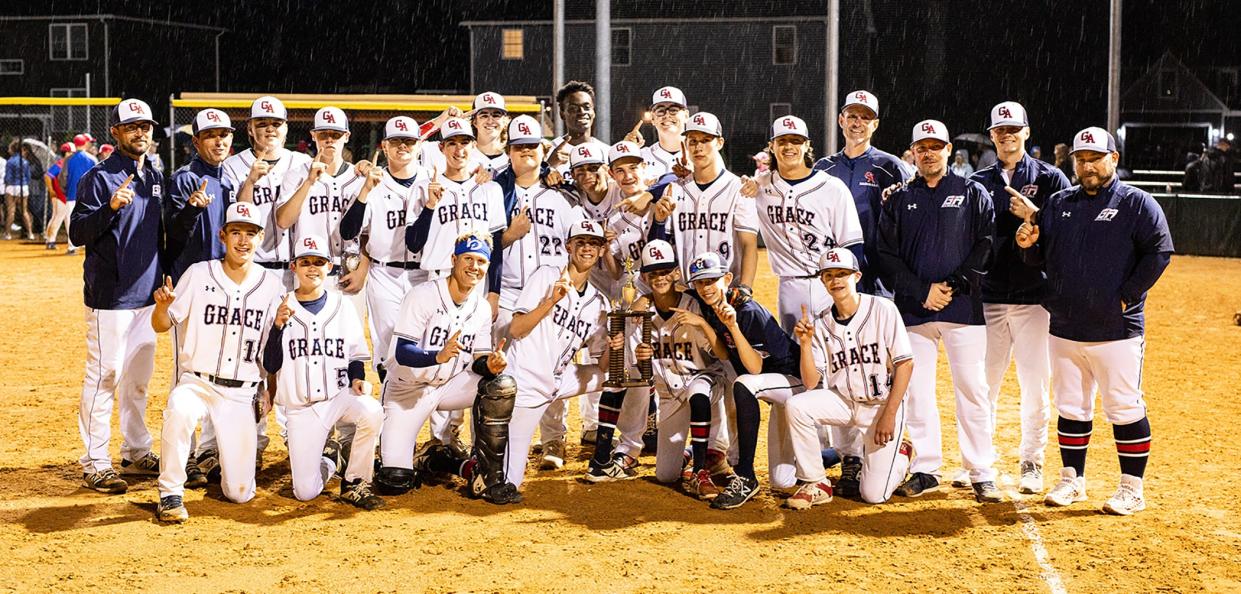 Grace Academy celebrates after defeating Heritage Academy 4-2 in the Mason Dixon Christian Conference title game.