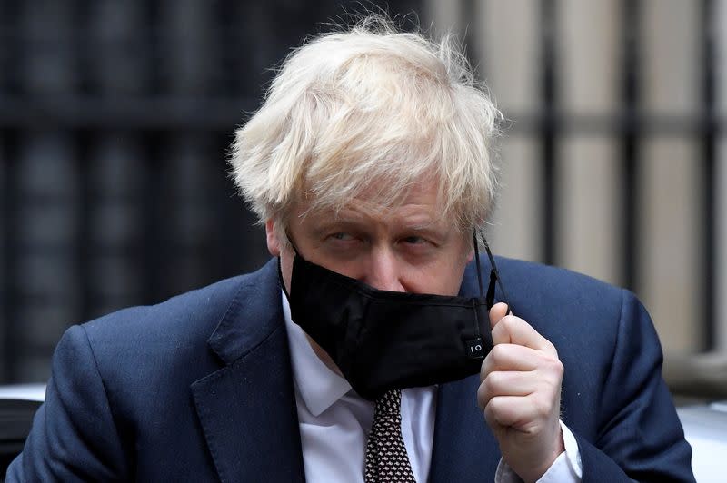 Britain's Prime Minister Boris Johnson arrives at Downing Street in London