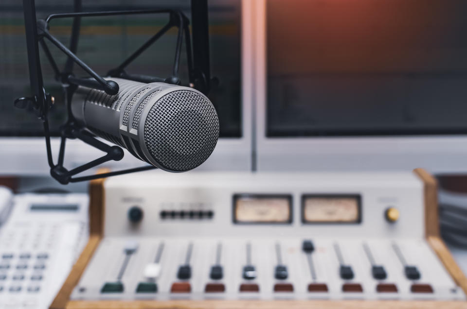 A radio mixing board and mic are pictured.