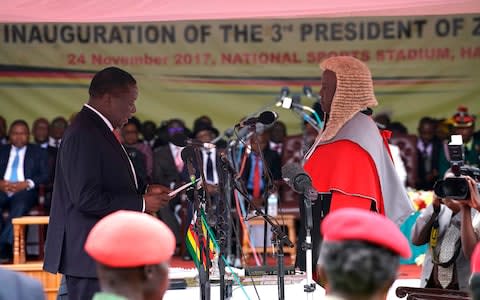 Emmerson Mnangagwa is sworn in as president in Harare - Credit: AFP