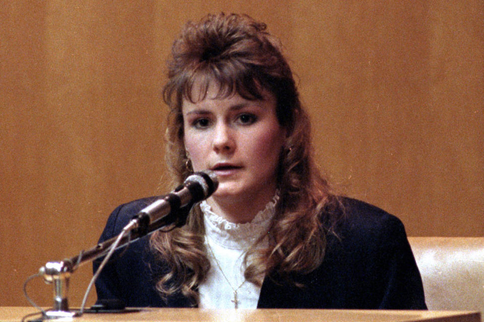 FILE - Pamela Smart answers questions from the defense in her murder conspiracy trial, March 18, 1991, in Rockingham County Superior Court in Exeter, N.H. Smart, who is serving life in prison for plotting with her teenage student to have her husband killed in 1990, accepted full responsibility for his death for the first time in a videotaped statement released Tuesday, June 11, 2024, as part of her latest sentence reduction request. (AP Photo/Jon Pierre Lasseigne, File)