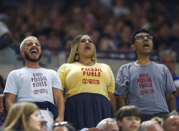 Environmental protesters force a stop in play during a semifinal match between Coco Gauff and Karolina Muchova at the 2023 U.S. Open on Thursday in Flushing, N.Y. Photo by John Angelillo/UPI