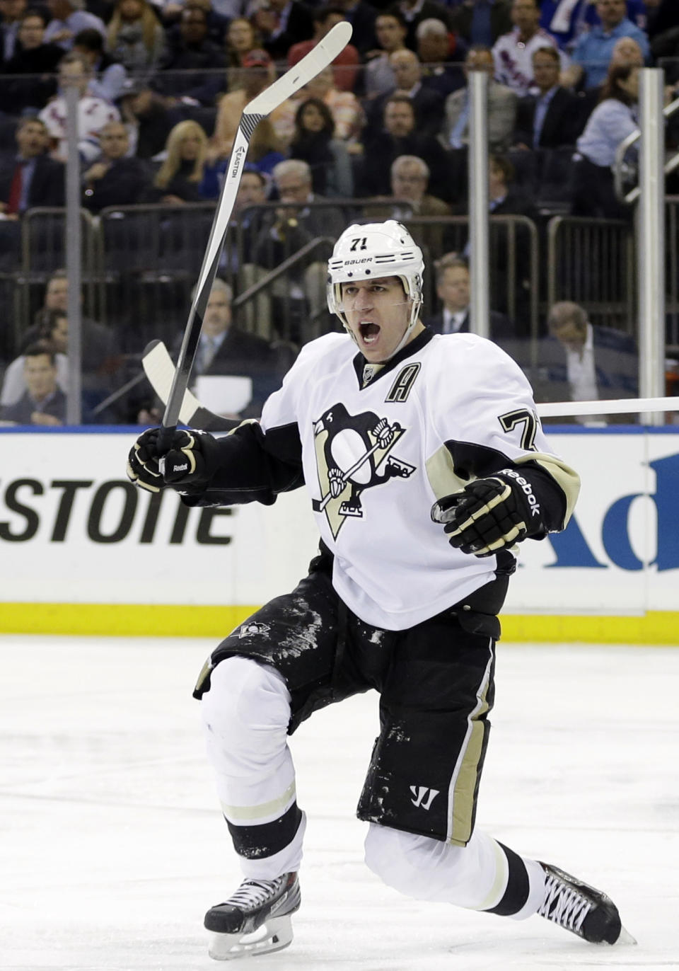 Pittsburgh Penguins' Evgeni Malkin (71), of Russia, celebrates a goal during the first period of a second-round NHL Stanley Cup hockey playoff series against the New York Rangers, Wednesday, May 7, 2014, in New York. (AP Photo/Frank Franklin II)