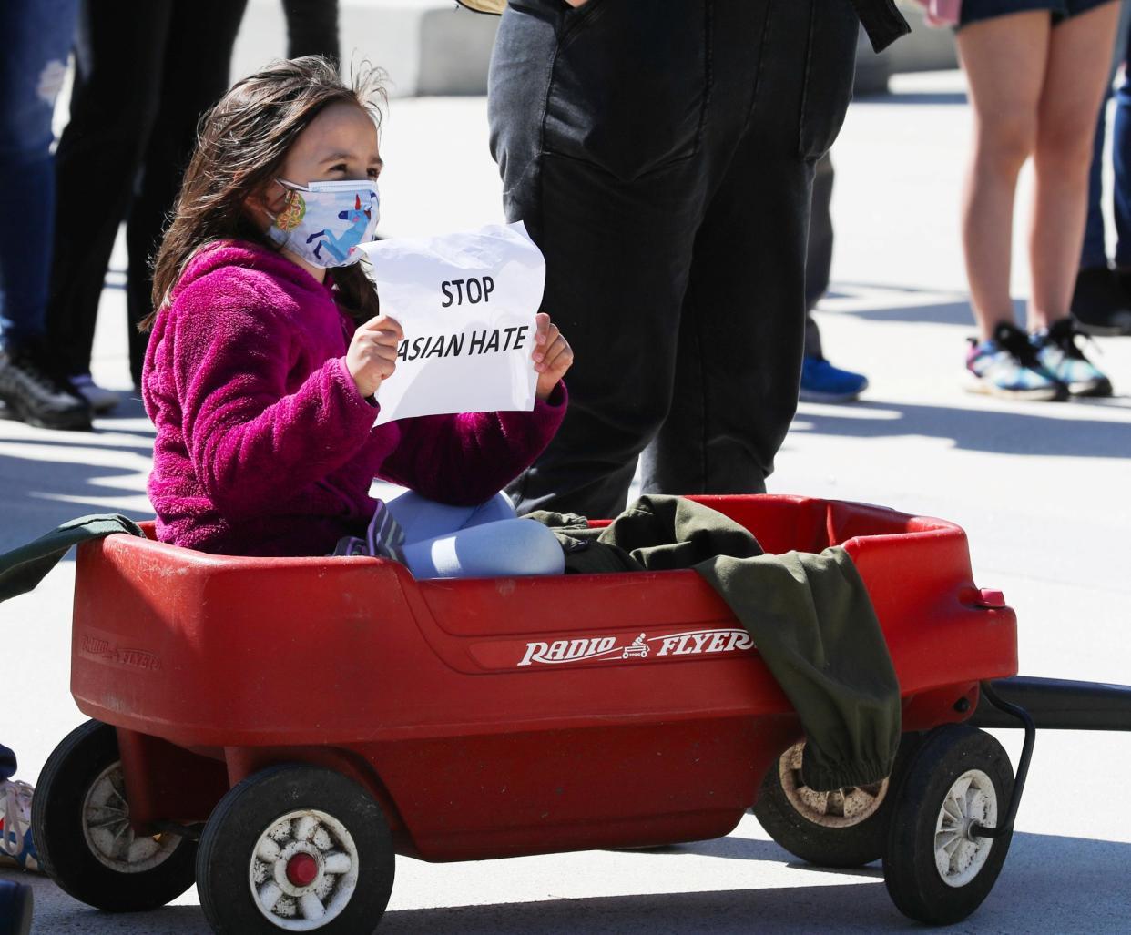 ATLANTA, March 20, 2021 -- A girl protests hate crimes against Asian Americans in Atlanta, Georgia, the United States, March 20, 2021. Hundreds of protesters of all ages and ethnicities gathered Saturday in Atlanta, Georgia, to protest hate crimes against Asian Americans, days after multiple shootings in and around the city killed eight people, among whom six were Asian women. (Photo by XiaoHeng Wang/Xinhua via Getty) (Xinhua/XiaoHeng Wan via Getty Images)