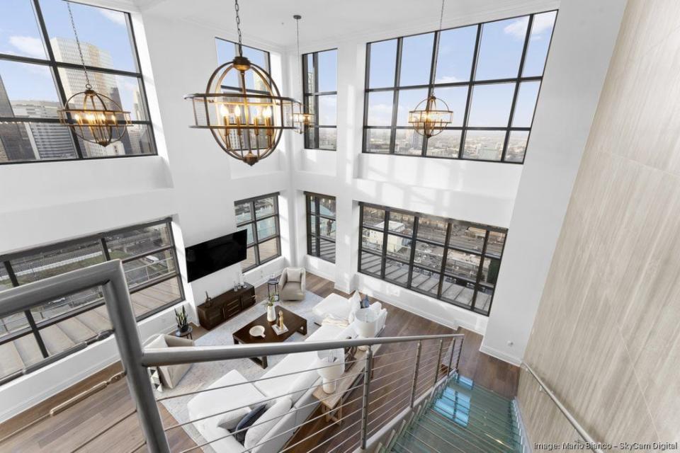 Former Carolina Panthers running back Christian McCaffrey is listing his penthouse in uptown Charlotte's Skye Condominiums building for $3.75 million