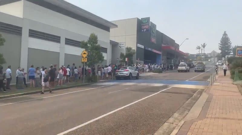 A social media picture shows a long queue forming at a Woolworths supermarket in Ulladulla, New South Wales