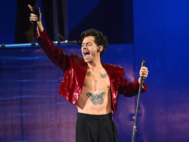 <p>Samir Hussein/WireImage</p> Harry Styles performs on stage during The BRIT Awards 2023