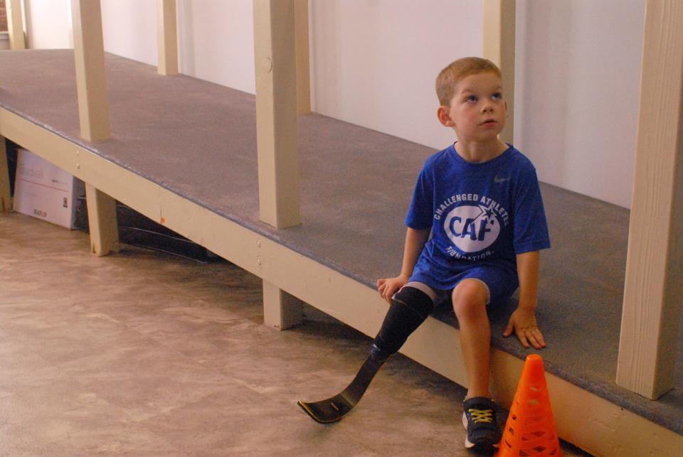 Three-year-old TJ DeAngelo, of Derry, New Hampshire, was born with a congenital condition that resulted in amputation. He is pictured here with his new running "blade" gifted to him by the Challenged Athletes Foundation.