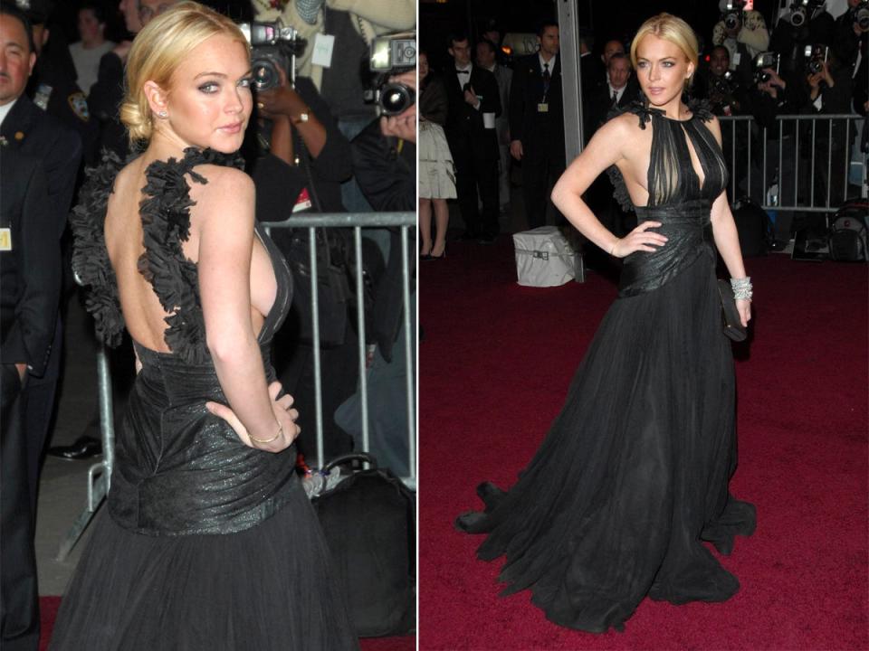 A side-by-side of Lindsay Lohan looking over her shoulder in a backless, black dress and standing on a red carpet in the same dress.
