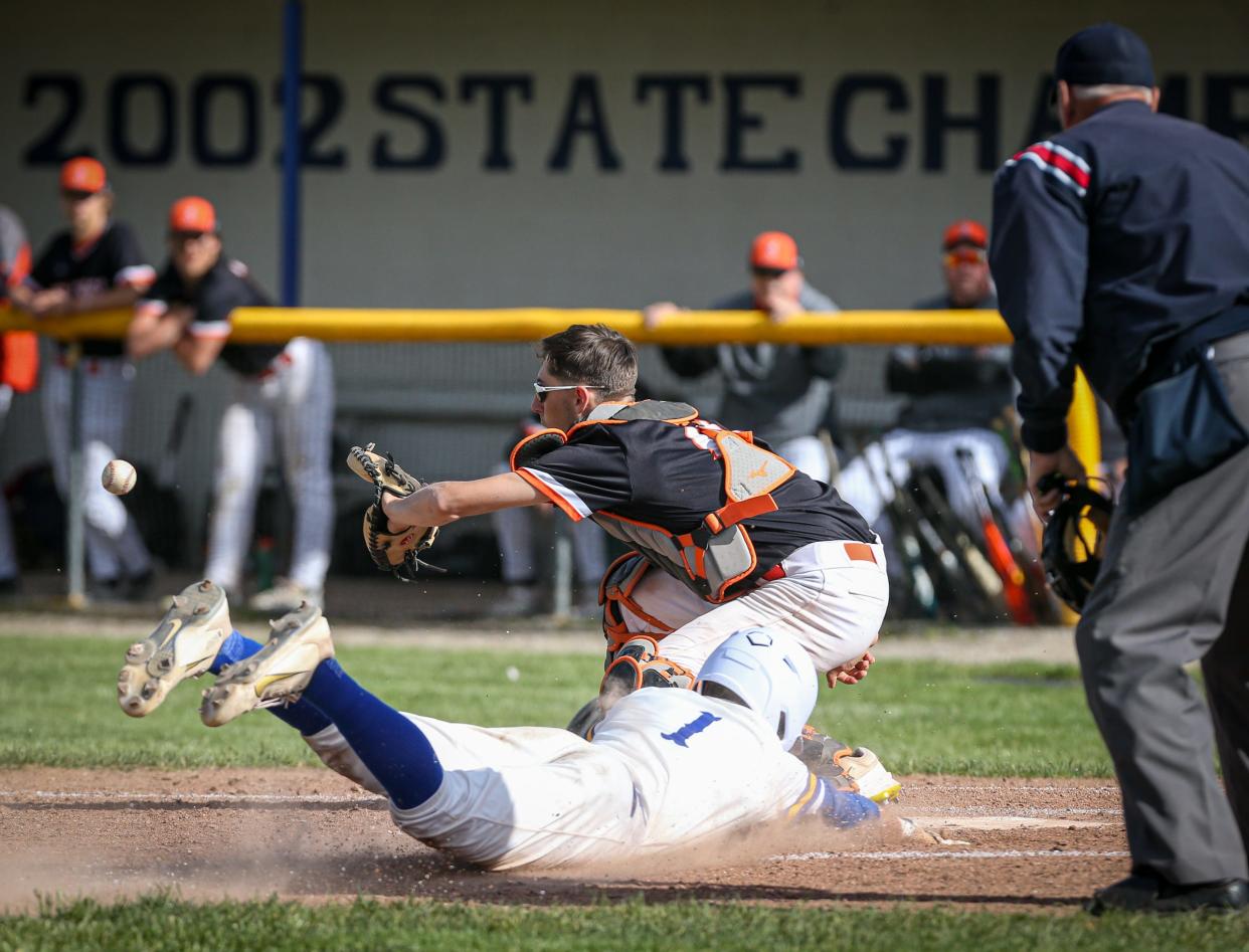 Luke Beaudrie of Jefferson slides safely home as Summerfield catcher Tyrus LaRocca to tie the first game of a doubleheader to tie the first game in the seventh inning on Friday, May 10, 2024. Jefferson won 3-2 and 14-9.