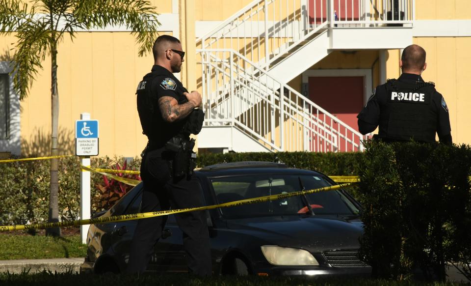 Palm Bay Police on Sunday at Woodlake Village, at the scene where three people were shot dead and two wounded in an apartment complex.