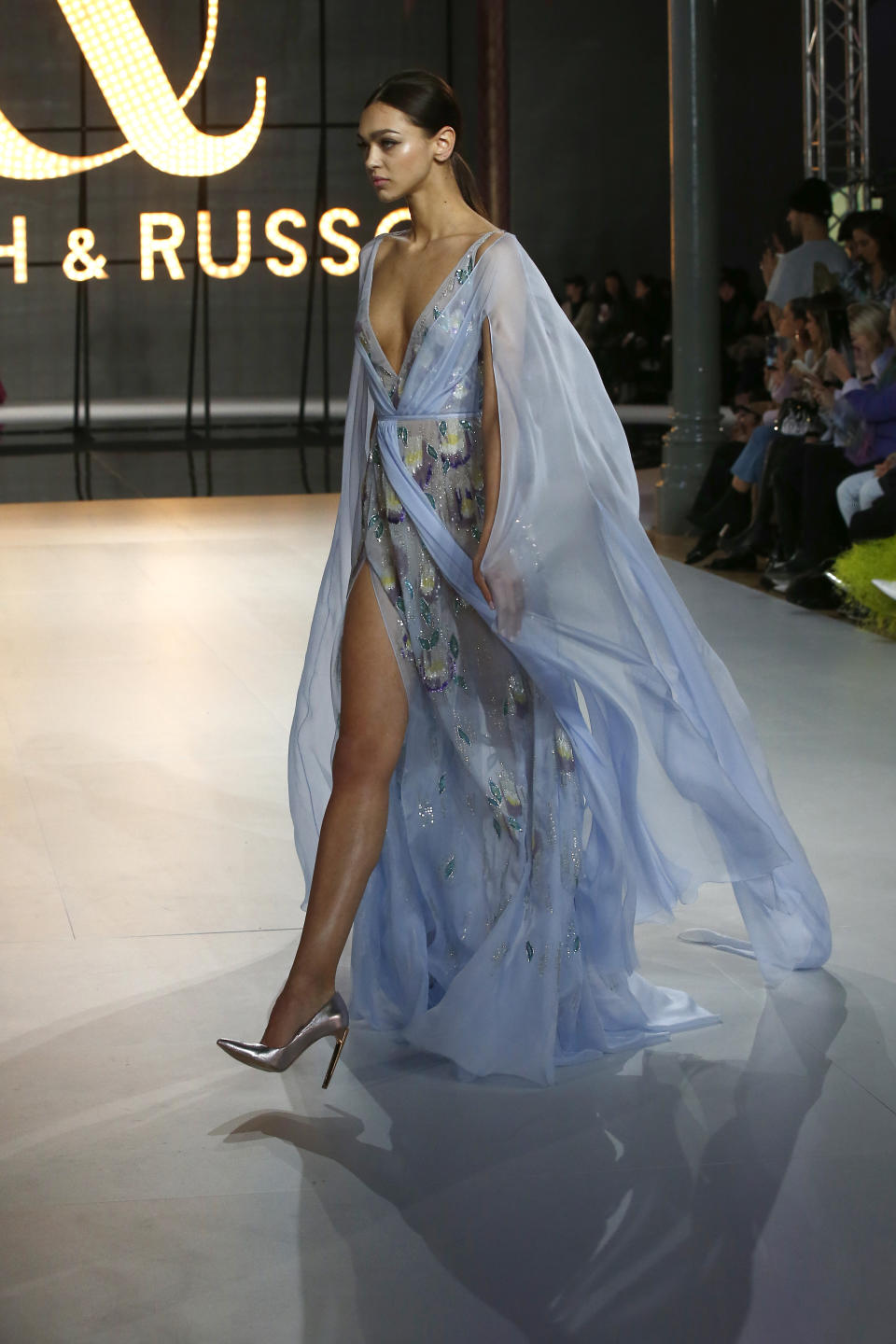 A model wears a creation for the Ralph & Russo Spring/Summer 2019 Haute Couture fashion collection presented in Paris, Monday Jan. 21, 2019. (AP Photo/Michel Euler)