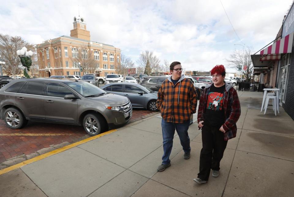 From left, Bear Bright and Marcus Stovall walk down the sidewalk across the street from the courthouse Saturday, Dec. 9, 2023 in Canyon, Tx.