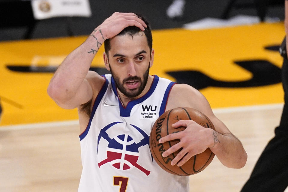 Denver Nuggets guard Facundo Campazzo reacts after being called for a foul during the second half of an NBA basketball game against the Los Angeles Lakers Monday, May 3, 2021, in Los Angeles. (AP Photo/Mark J. Terrill)