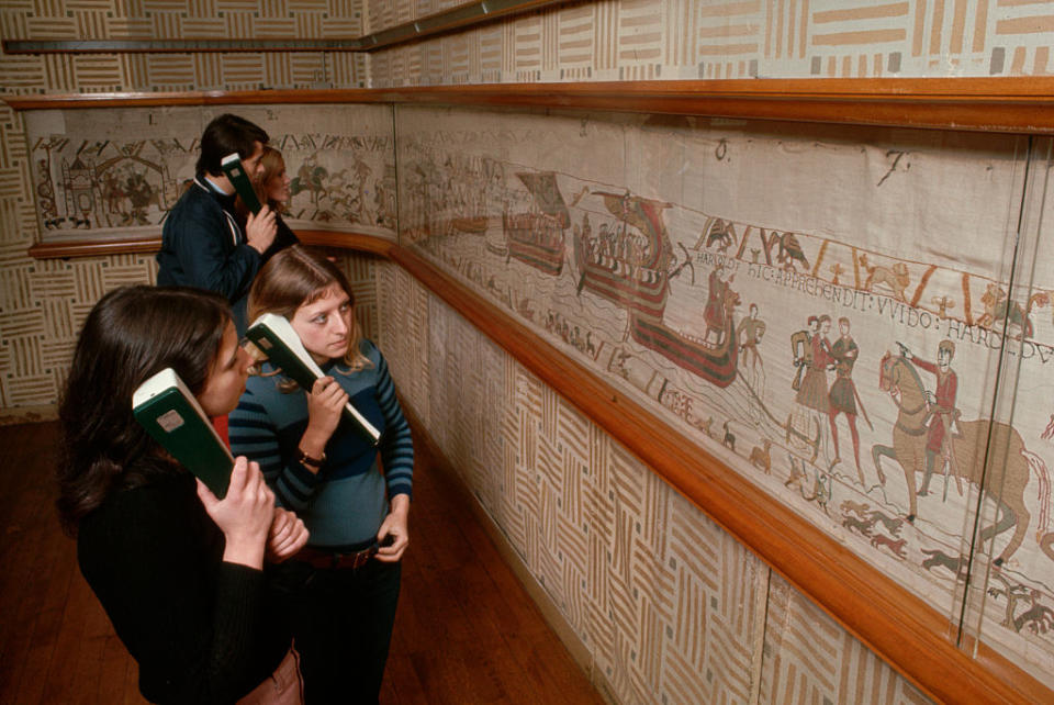 Visitors gaze at the tapestry (Picture: Getty)