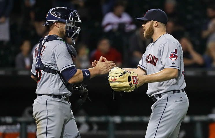 CHICAGO, IL - SEPTEMBER 14: Cody Allen #37 of the Cleveland Indians (R) shakes hands with Chris Gimenez #38 after a win against the Chicago White Sox at U.S. Cellular Field on September 14, 2016 in Chicago, Illinois. The Indians defeated the White Sox 6-1. (Photo by Jonathan Daniel/Getty Images)