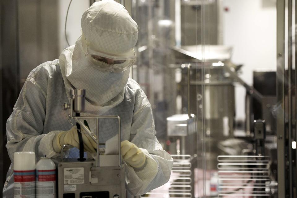 An employee works in a unit dedicated to the production of insulin pens at the factory of the U.S. pharmaceutical company Eli Lilly in Fegersheim, eastern France, on Oct. 12, 2015.