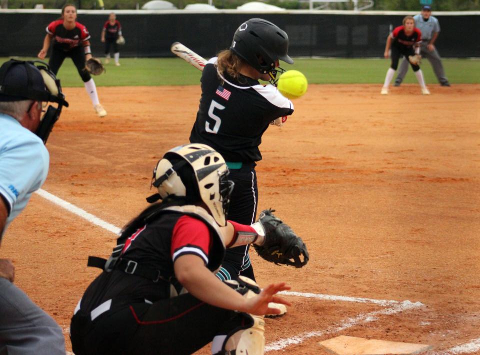 Providence batter Daci Sarver (5) fouls a ball back to the backstop against Middleburg  during a high school softball game on April 14, 2022. [Clayton Freeman/Florida Times-Union]