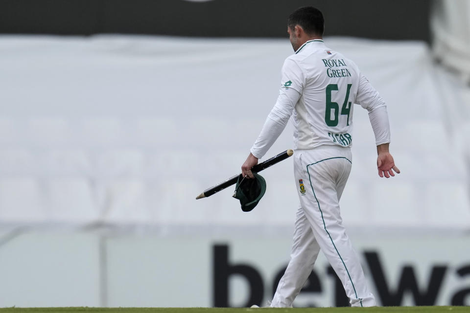 South Africa's Dean Elgar leaves the field at the end of the third day of the test cricket match between South Africa and India, at Centurion Park, in Centurion, on the outskirts of Pretoria, South Africa, Thursday, Dec. 28, 2023. (AP Photo/Themba Hadebe)