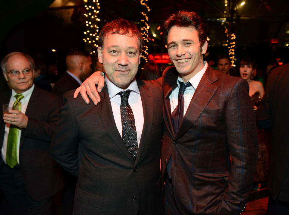 FILE - In this Wednesday, Feb. 13, 2013 file photo, Sam Raimi and James Franco attend the World Premiere of "Oz The Great and Powerful" after party in Los Angeles. Returning to the mystical land of “The Wizard of Oz” apparently takes more than 70 years and hundreds of millions of dollars. Disney will release its anticipated prequel to the 1939 movie on Friday, Feb. 7, 2013. Directed by Raimi, “Oz the Great and Powerful” explores the origins of the wizard (James Franco) and the witches (Mila Kunis, Michelle Williams and Rachel Weisz) in a three-dimensional Oz. (Photo by Jordan Strauss/Invision/AP, File)