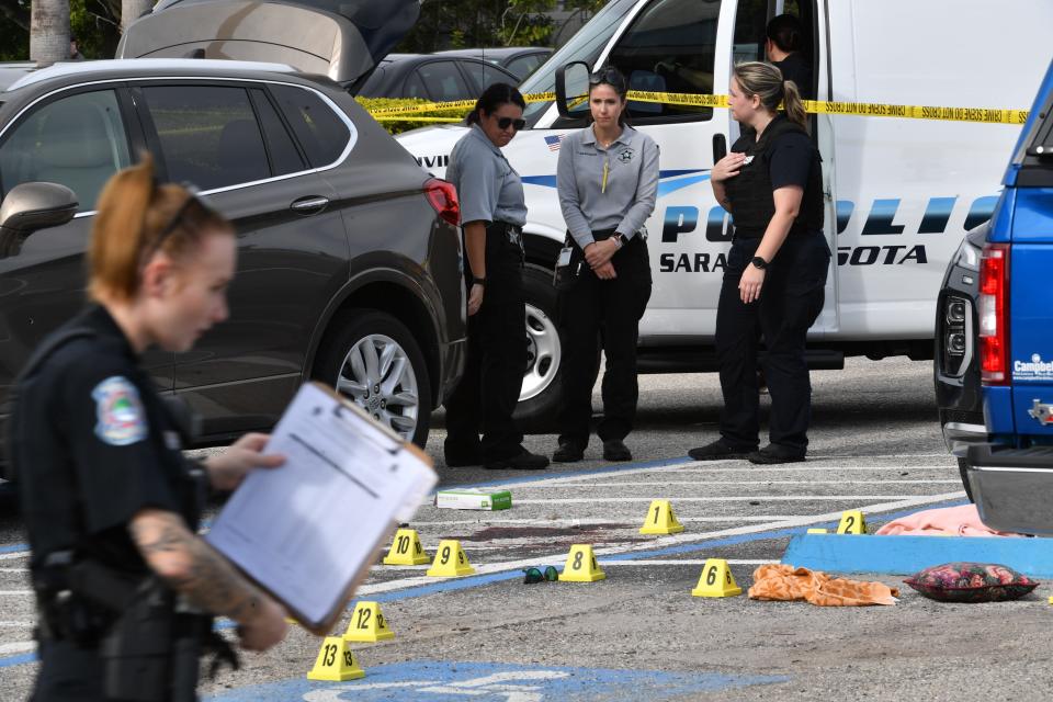 Crime scene technicians from the Sarasota Police Department and Sarasota County Sheriff's Office were on the scene of a shooting Friday, Jan. 19, 2024. One person died in the shooting in front of the U.S. Post Office at Sarasota Commons shopping center on North Beneva Road.