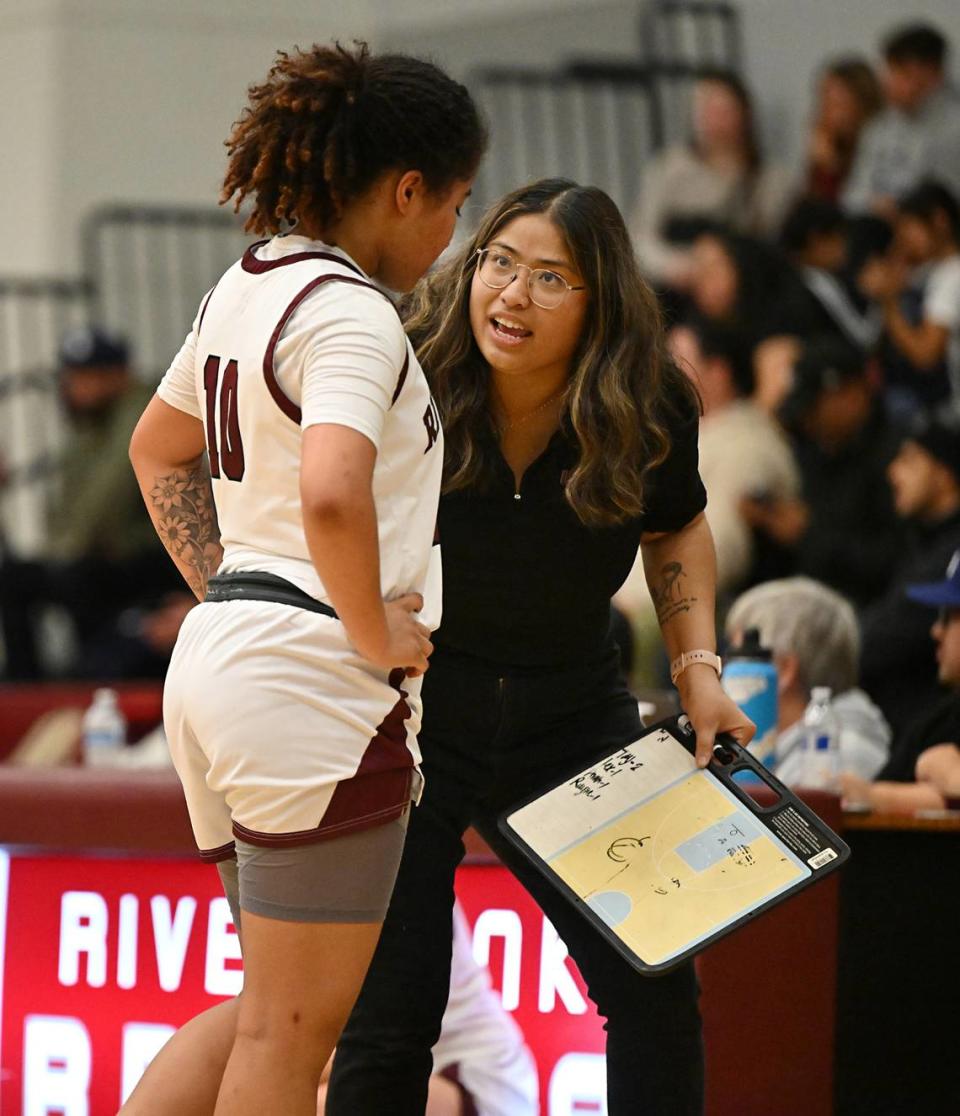 Riverbank coach Janelle Luu talks with Chancis Gamez during the CIF Northern California Division IV playoff game with Notre Dame at Riverbank High School in Riverbank, Calif., Thursday, Feb. 29, 2024. Andy Alfaro/aalfaro@modbee.com
