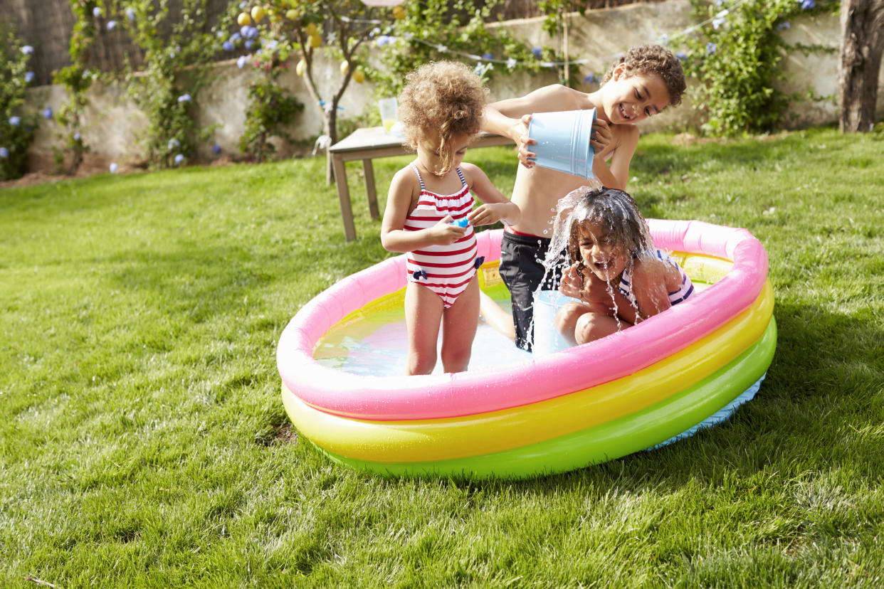 A mum has shared a simple yet genius paddling pool hack to keep the water bug-free between use [Photo: Getty]