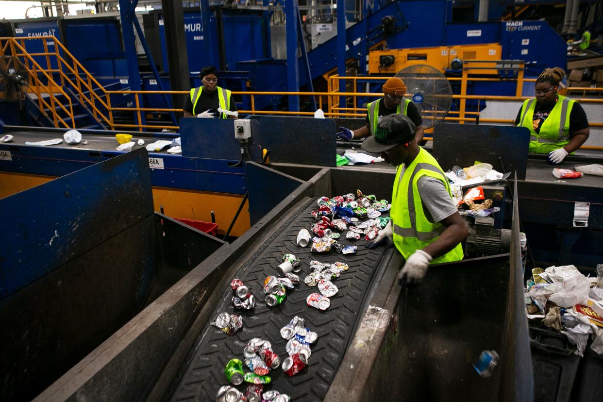 Materials are sorted and divided up at the Rumpke Recycling Facility on August 24, 2021. 