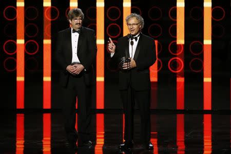 Life Science laureates Gary Ruvkun (L) and Victor Ambros speak on stage during the 2nd annual Breakthrough Prize Awards in Mountain View, California November 9, 2014. REUTERS/Stephen Lam