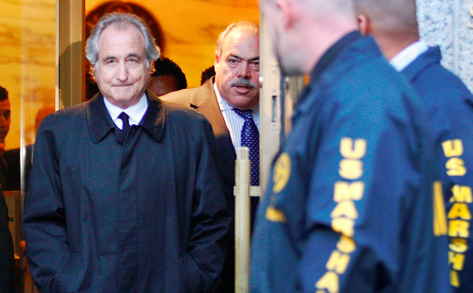 In this Jan. 5, 2009 file photo, Bernard Madoff leaves U.S. District Court in New York. (AP Photo/Kathy Willens)