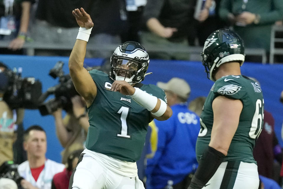 Philadelphia Eagles quarterback Jalen Hurts (1) celebrates after scoring a touchdown during the first half of the NFL Super Bowl 57 football game between the Kansas City Chiefs and the Philadelphia Eagles, Sunday, Feb. 12, 2023, in Glendale, Ariz. (AP Photo/Seth Wenig)