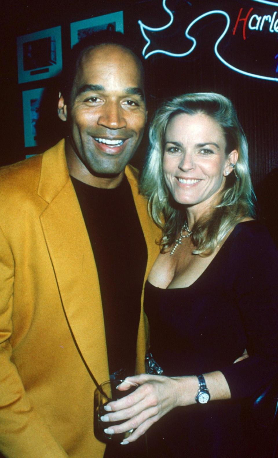 OJ Simpson and wife Nicole Brown Simpson. He was acquitted of her murder in 1995 (Rex)