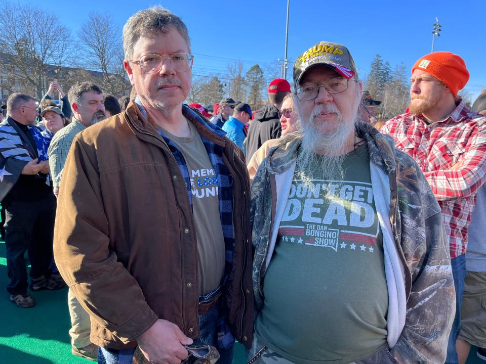 John LaClair, right, and his brother Dennis, left, attend a Trump rally in Durham, N.H.