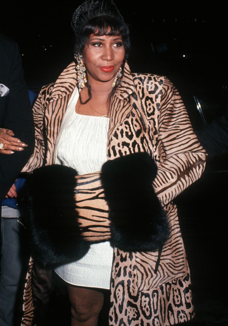 Aretha Franklin in a leopard print jacket