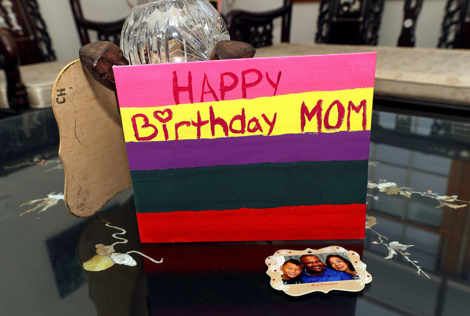 A wooden birthday card Christian made for his mother decorates a table top in the Halls home. (Fred Adams for Spotlight PA and NBC News)
