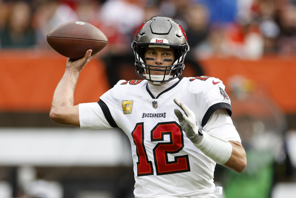 Tampa Bay Buccaneers quarterback Tom Brady (12) throws a pass during the first half of an NFL football game against the Cleveland Browns in Cleveland, Sunday, Nov. 27, 2022. (AP Photo/Ron Schwane)