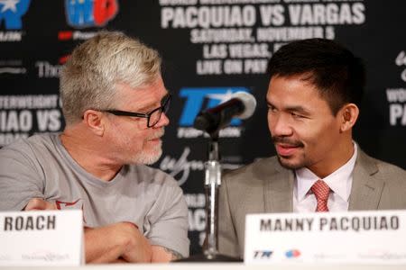 USA Boxing - Manny Pacquiao & Jessie Vargas - Head-to-Head Press Conference - Beverly Hills Hotel, Beverly Hills - 8/9/16Manny Pacquiao & Freddie Roach during the press conference. REUTERS/Lucy Nicholson