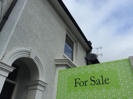 A "For Sale" sign is seen in from of a house in London, Britain October 30, 2015. REUTERS/Reinhard Krause
