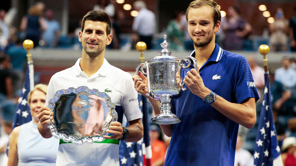 Novak Djokovic and Daniil Medvedev, pictured here with their trophies after the US Open final.