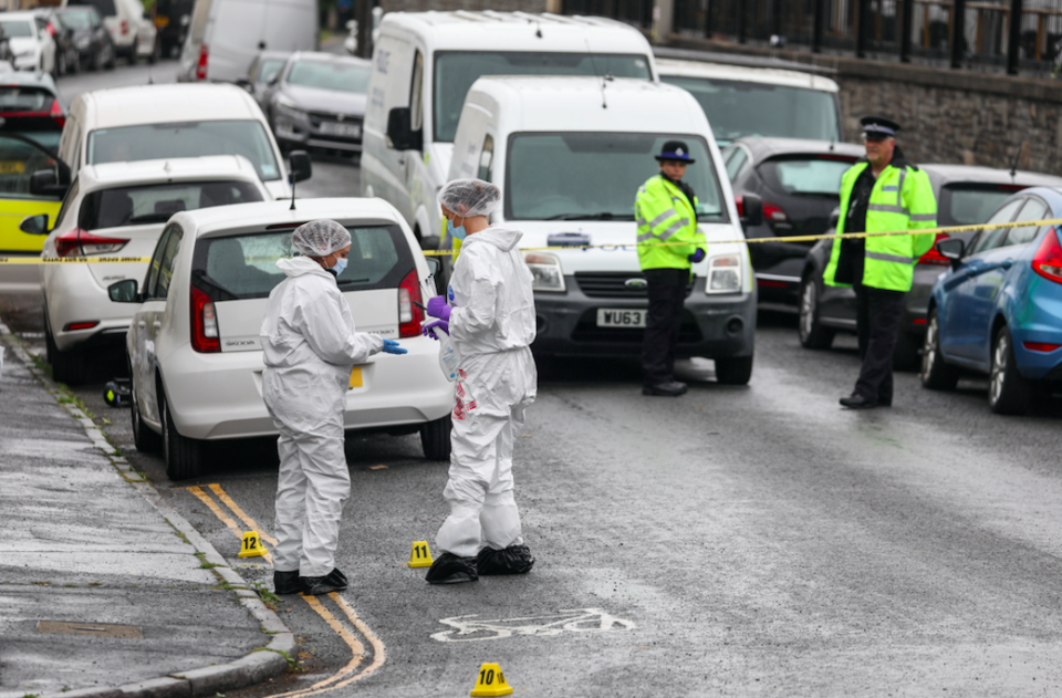 Police at the scene in Brislington following a disorder that left a man dead on Tuesday night. (SWNS)