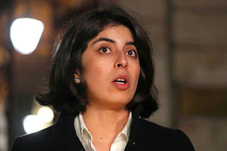 Daniela Tejada, wife of British academic Matthew Hedges who was jailed in U.A.E. for spying, talks to the media outside the Foreign and Commonwealth Office in London, Britain, November 22, 2018. REUTERS/Simon Dawson