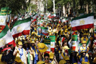 Supporters of a regime change in Iran rally outside United Nations headquarters on the first day of the general debate at the U.N. General Assembly, Tuesday, Sept. 24, 2019, in New York. (AP Photo/Jason DeCrow)