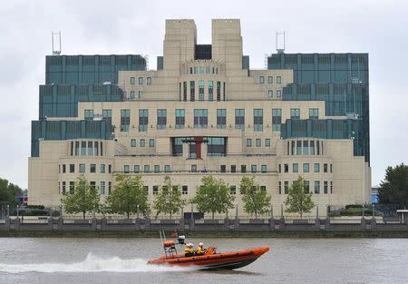 A motorboat passes by the MI6 building in London August 25, 2010. REUTERS/Toby Melville